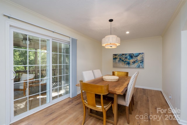 16132 Mclester Rd, Oakboro, NC 28129 - dining space with ornamental molding, baseboards, wood finished floors, and recessed lighting