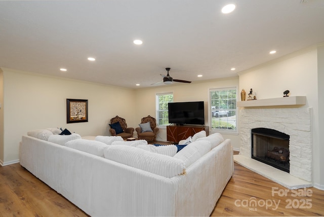 16132 Mclester Rd, Oakboro, NC 28129 - living area featuring recessed lighting, ceiling fan, light wood-style flooring, baseboards, and crown molding