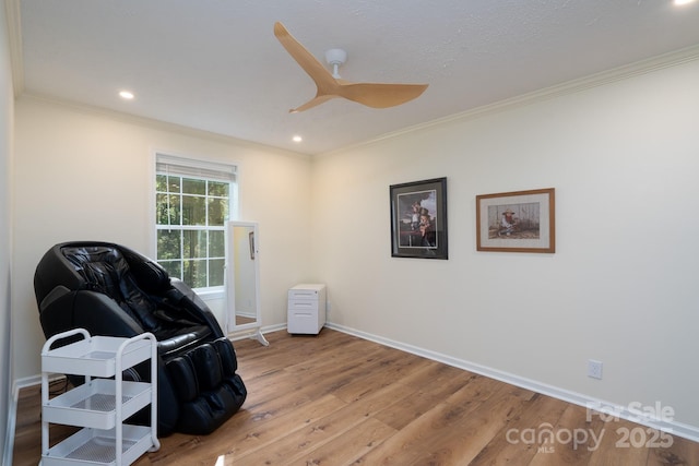 16132 Mclester Rd, Oakboro, NC 28129 - living area featuring light wood finished floors, recessed lighting, crown molding, baseboards, and ceiling fan