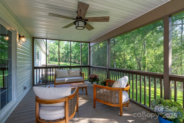 16132 Mclester Rd, Oakboro, NC 28129 - sunroom featuring a ceiling fan and an outdoor hangout area