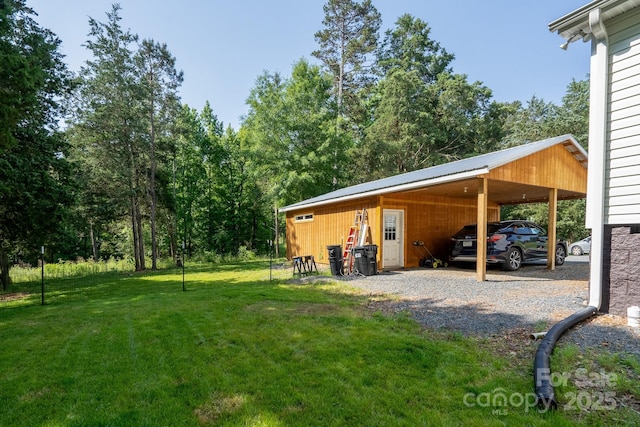 16132 Mclester Rd, Oakboro, NC 28129 - view of green lawn featuring driveway and an outbuilding
