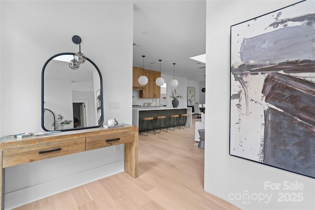 3822 Topsfield Rd, Charlotte, NC 28211 - interior space featuring light wood finished floors and a sink