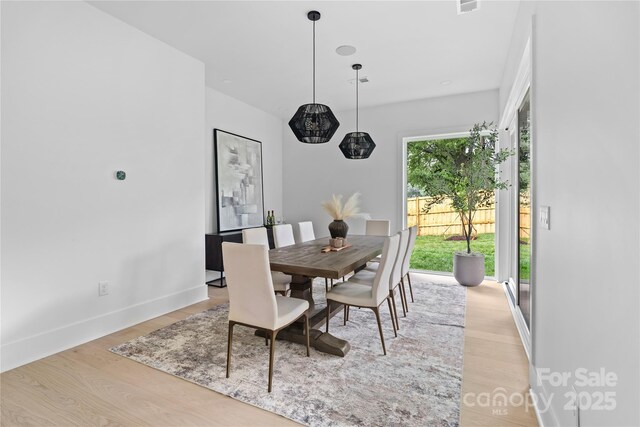 3822 Topsfield Rd, Charlotte, NC 28211 - dining space with light wood-style flooring and baseboards