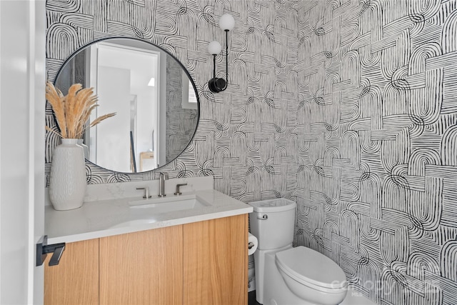 3822 Topsfield Rd, Charlotte, NC 28211 - bathroom featuring wallpapered walls and vanity