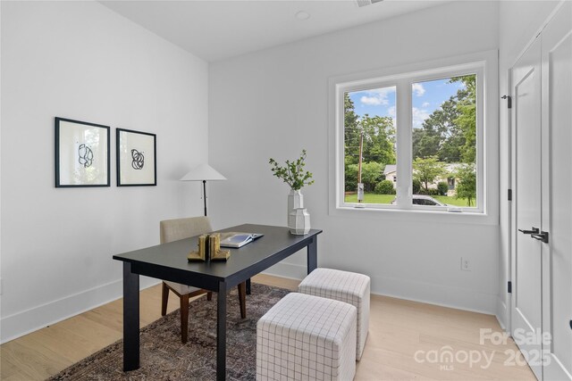 3822 Topsfield Rd, Charlotte, NC 28211 - home office with light wood finished floors and baseboards