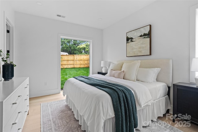 3822 Topsfield Rd, Charlotte, NC 28211 - bedroom featuring access to outside and light wood-style flooring