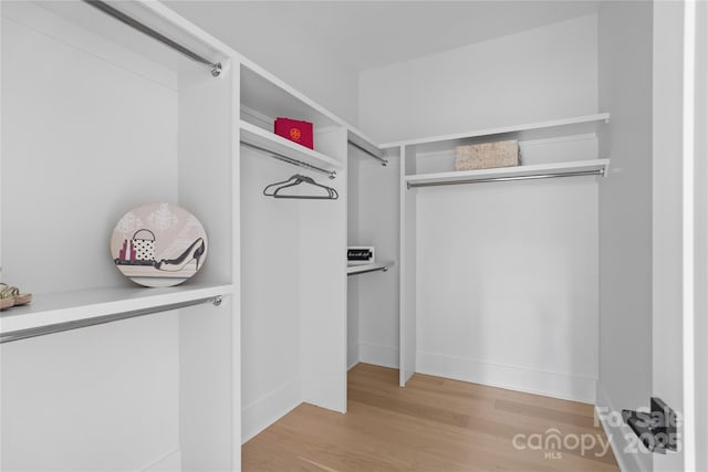 3822 Topsfield Rd, Charlotte, NC 28211 - walk in closet featuring wood finished floors
