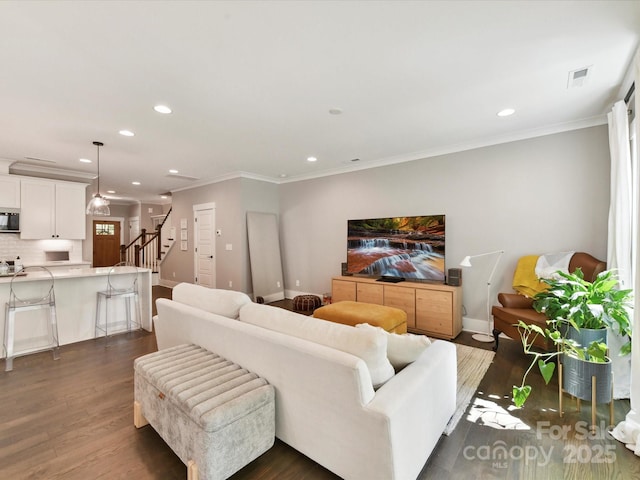 2517 Marlowe Ave, Charlotte, NC 28208 - living room featuring baseboards, stairway, recessed lighting, dark wood finished floors, and ornamental molding