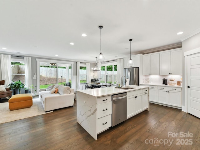 2517 Marlowe Ave, Charlotte, NC 28208 - kitchen featuring stainless steel appliances, open floor plan, healthy amount of natural light, white cabinets, and recessed lighting