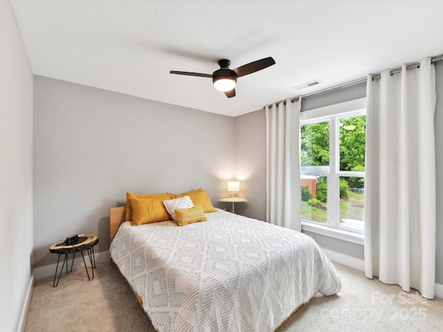 2517 Marlowe Ave, Charlotte, NC 28208 - bedroom featuring light carpet, baseboards, and a ceiling fan