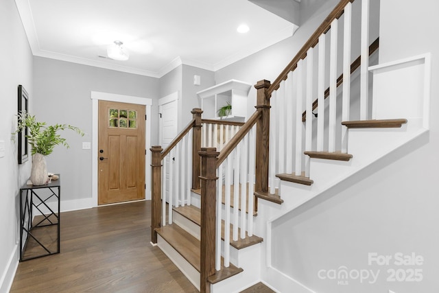2517 Marlowe Ave, Charlotte, NC 28208 - entrance foyer with wood finished floors, stairs, crown molding, and recessed lighting
