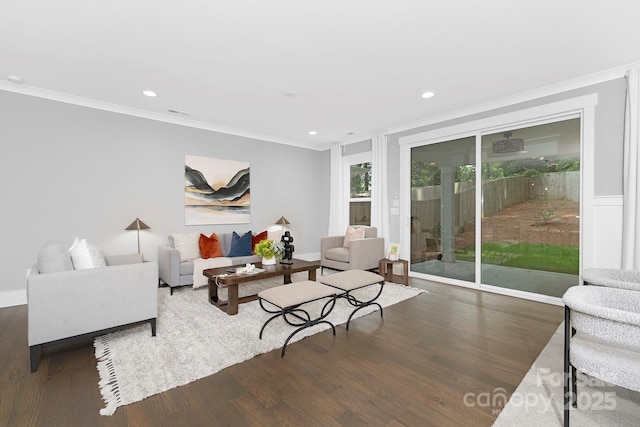 2517 Marlowe Ave, Charlotte, NC 28208 - living area with crown molding, wood finished floors, and recessed lighting
