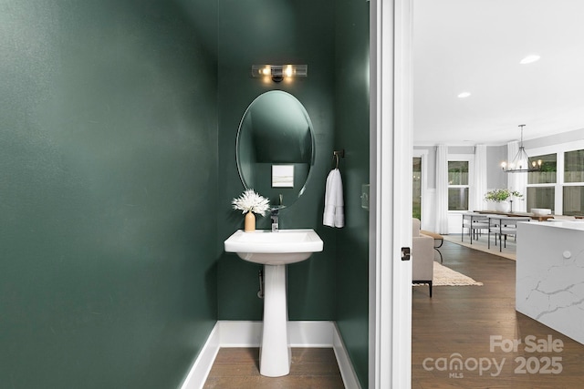 2517 Marlowe Ave, Charlotte, NC 28208 - bathroom featuring a chandelier, wood finished floors, and recessed lighting