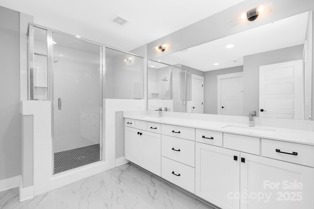 2517 Marlowe Ave, Charlotte, NC 28208 - full bathroom featuring double vanity, recessed lighting, a stall shower, and marble look tiles