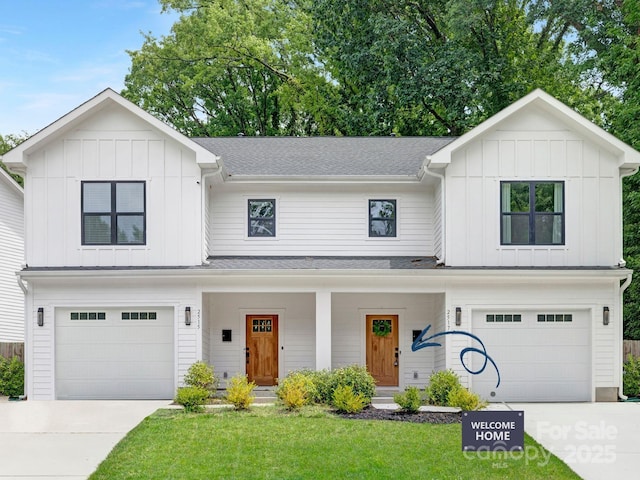 2517 Marlowe Ave, Charlotte, NC 28208 - modern farmhouse style home featuring board and batten siding, an attached garage, and driveway