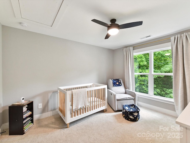 2517 Marlowe Ave, Charlotte, NC 28208 - carpeted bedroom with a crib, attic access, and ceiling fan