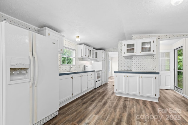 1884 Kensway Dr, Hudson, NC 28638 - kitchen with white appliances, white cabinets, glass insert cabinets, dark wood-type flooring, and a sink