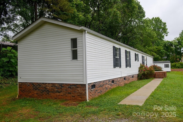 1884 Kensway Dr, Hudson, NC 28638 - view of property exterior featuring crawl space and a yard