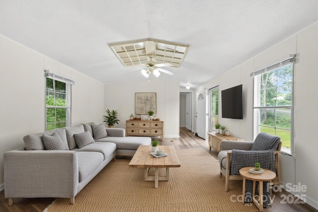 1884 Kensway Dr, Hudson, NC 28638 - living area with light wood-type flooring, vaulted ceiling, and ceiling fan