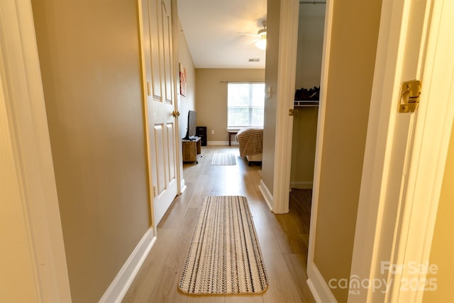 11867 Ridgeway Park Dr, Charlotte, NC 28277 - hallway featuring light wood finished floors