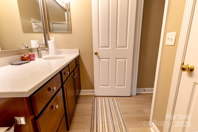 11867 Ridgeway Park Dr, Charlotte, NC 28277 - bathroom featuring vanity and wood finished floors