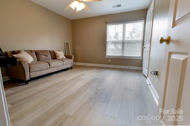 11867 Ridgeway Park Dr, Charlotte, NC 28277 - living area featuring light wood-style floors and a ceiling fan