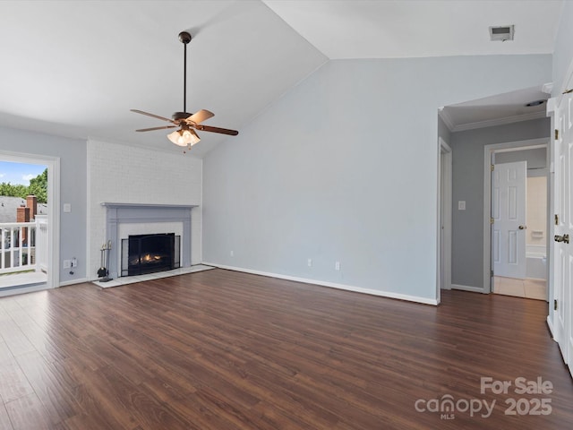 9404 S Vicksburg Park Ct, Charlotte, NC 28210 - unfurnished living room with ceiling fan, vaulted ceiling, wood finished floors, a fireplace, and baseboards