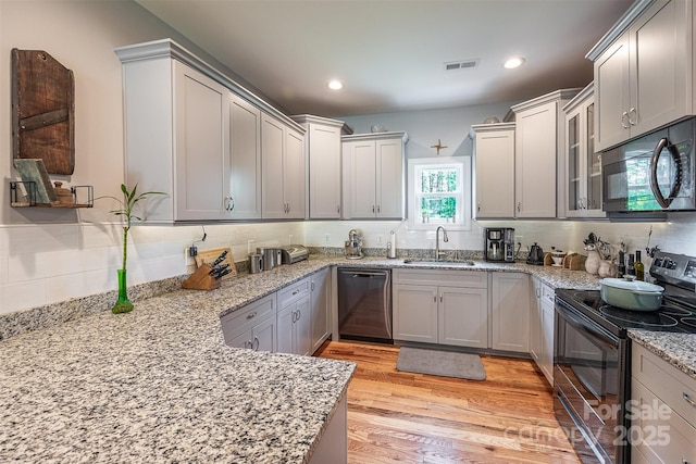 2146 Derby Ct, Morganton, NC 28655 - kitchen with dishwashing machine, electric range, a sink, backsplash, and recessed lighting