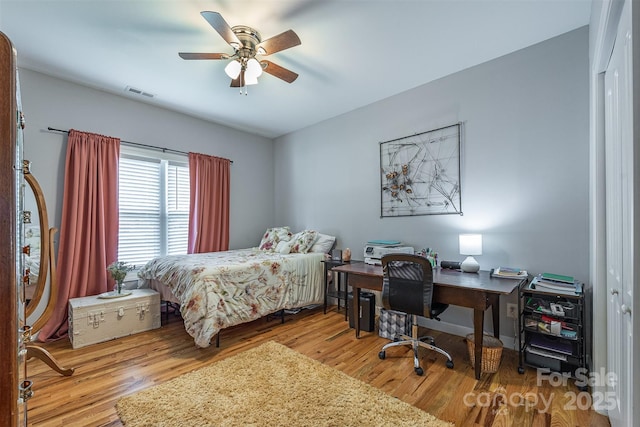 2146 Derby Ct, Morganton, NC 28655 - bedroom with wood finished floors, ceiling fan, and an office area