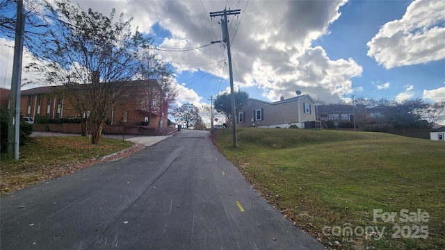 210 Mahan St SW, Concord, NC 28025 - view of asphalt street featuring a residential view