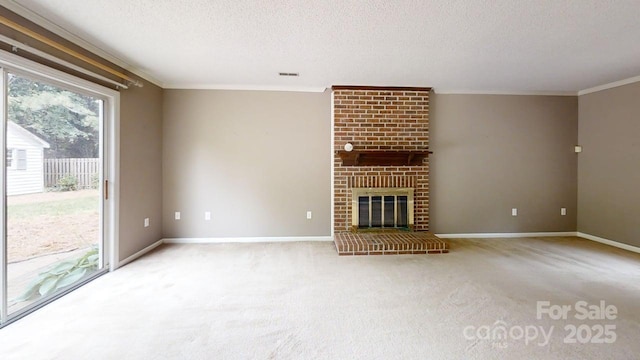 2507 Birnen Dr, Charlotte, NC 28210 - unfurnished living room with a textured ceiling, ornamental molding, carpet flooring, baseboards, and a brick fireplace