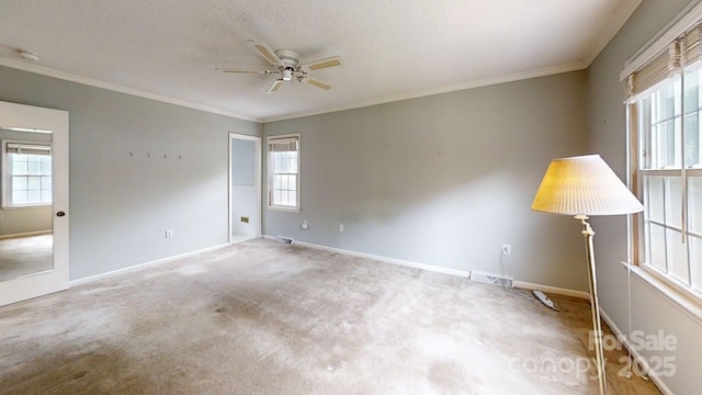 2507 Birnen Dr, Charlotte, NC 28210 - empty room featuring ceiling fan, crown molding, baseboards, carpet floors, and a smoke detector