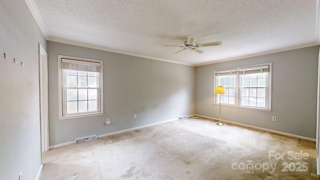 2507 Birnen Dr, Charlotte, NC 28210 - empty room with a textured ceiling, a ceiling fan, carpet floors, ornamental molding, and baseboards