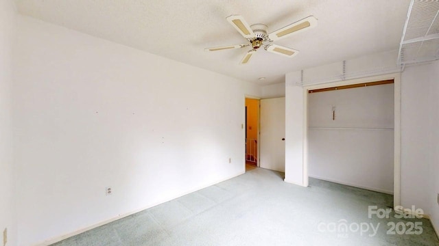2507 Birnen Dr, Charlotte, NC 28210 - unfurnished bedroom with a closet, ceiling fan, and light carpet