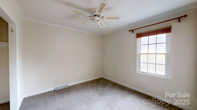 2507 Birnen Dr, Charlotte, NC 28210 - unfurnished room with ceiling fan, a textured ceiling, carpet, baseboards, and ornamental molding