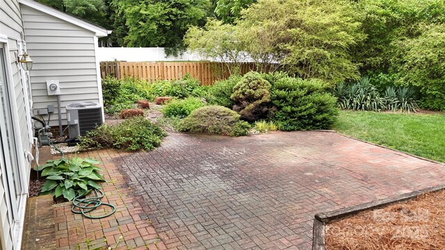 2507 Birnen Dr, Charlotte, NC 28210 - view of patio / terrace with central AC