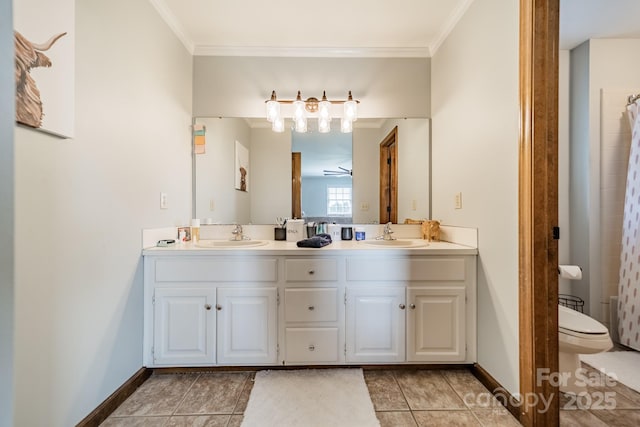 8698 Rocky River Rd, Harrisburg, NC 28075 - full bath featuring double vanity, toilet, tile patterned floors, baseboards, and crown molding