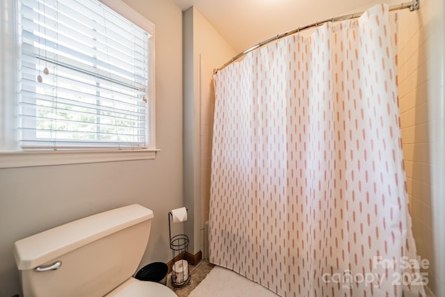 8698 Rocky River Rd, Harrisburg, NC 28075 - full bathroom with toilet and curtained shower