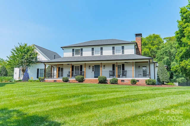 8698 Rocky River Rd, Harrisburg, NC 28075 - view of front of property with a chimney, a front yard, and a ceiling fan