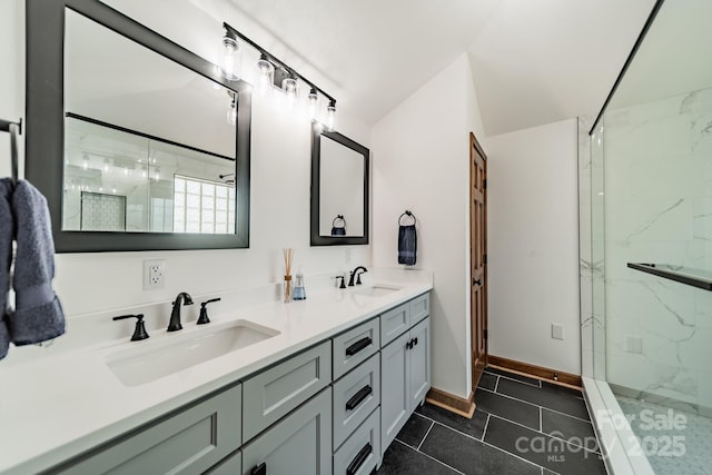 8698 Rocky River Rd, Harrisburg, NC 28075 - full bathroom featuring double vanity, a marble finish shower, baseboards, and tile patterned flooring