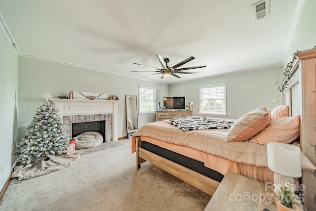 8698 Rocky River Rd, Harrisburg, NC 28075 - bedroom featuring carpet flooring, a fireplace, crown molding, ceiling fan, and baseboards