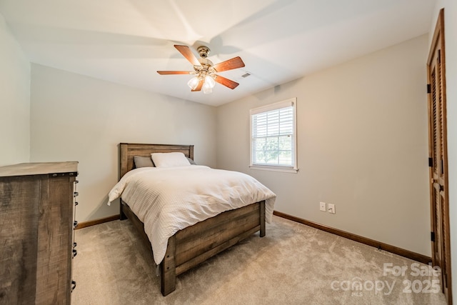 8698 Rocky River Rd, Harrisburg, NC 28075 - bedroom with baseboards, light colored carpet, and ceiling fan