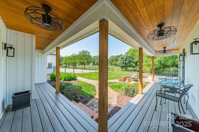 8698 Rocky River Rd, Harrisburg, NC 28075 - wooden deck with ceiling fan
