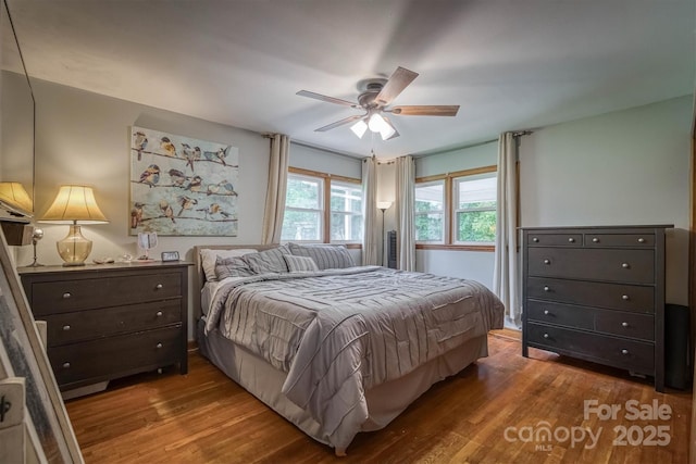 826 Jamestown Rd, Morganton, NC 28655 - bedroom featuring wood finished floors and ceiling fan