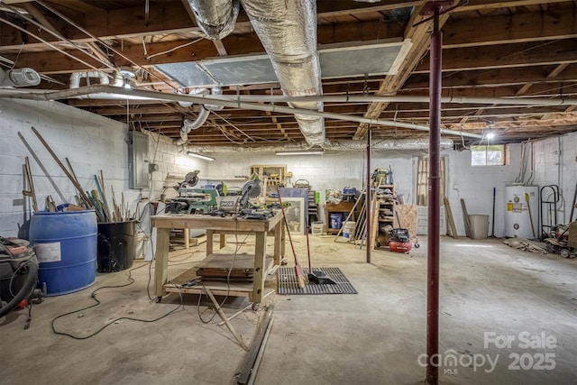 826 Jamestown Rd, Morganton, NC 28655 - unfinished below grade area featuring water heater, a workshop area, and electric panel