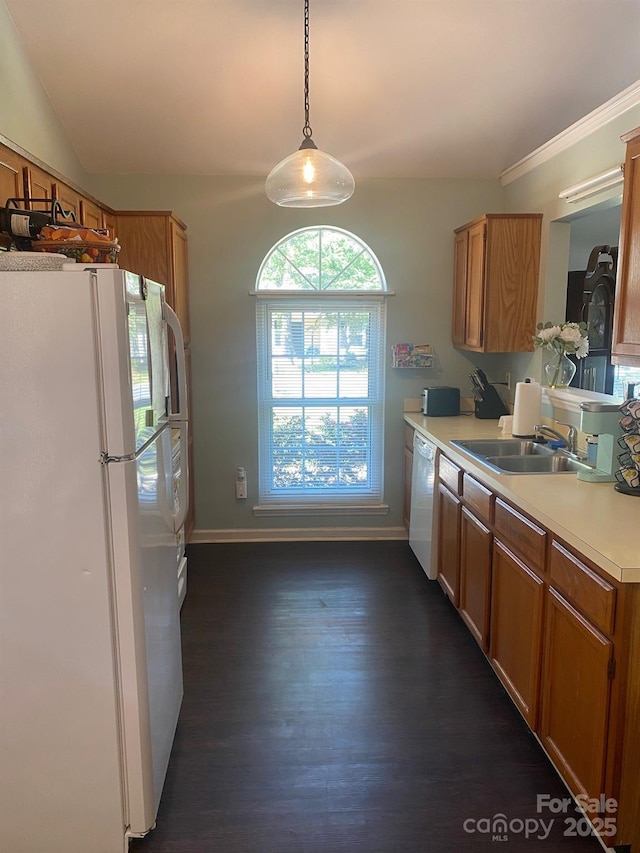9612 Farmridge Ln, Matthews, NC 28105 - kitchen featuring white appliances, a sink, light countertops, dark wood-style flooring, and brown cabinets