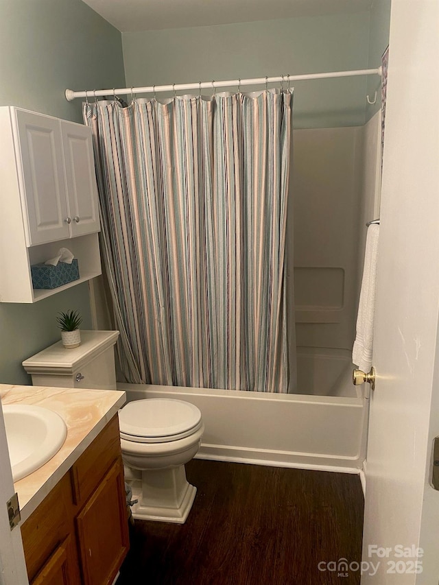 9612 Farmridge Ln, Matthews, NC 28105 - bathroom with vanity, wood finished floors, toilet, and shower / bath combination with curtain