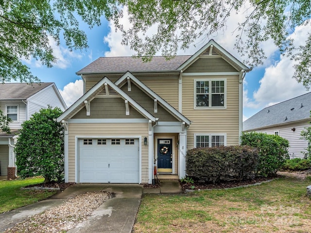 10639 Secret Garden Ln, Charlotte, NC 28214 - view of front facade featuring driveway, a garage, and a shingled roof