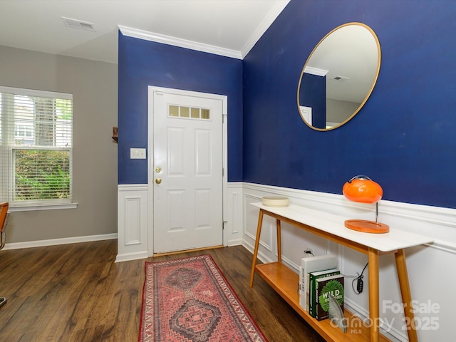 10639 Secret Garden Ln, Charlotte, NC 28214 - entrance foyer with a wainscoted wall, wood finished floors, and crown molding