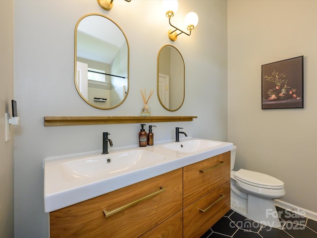 10639 Secret Garden Ln, Charlotte, NC 28214 - full bathroom with double vanity, toilet, and tile patterned floors
